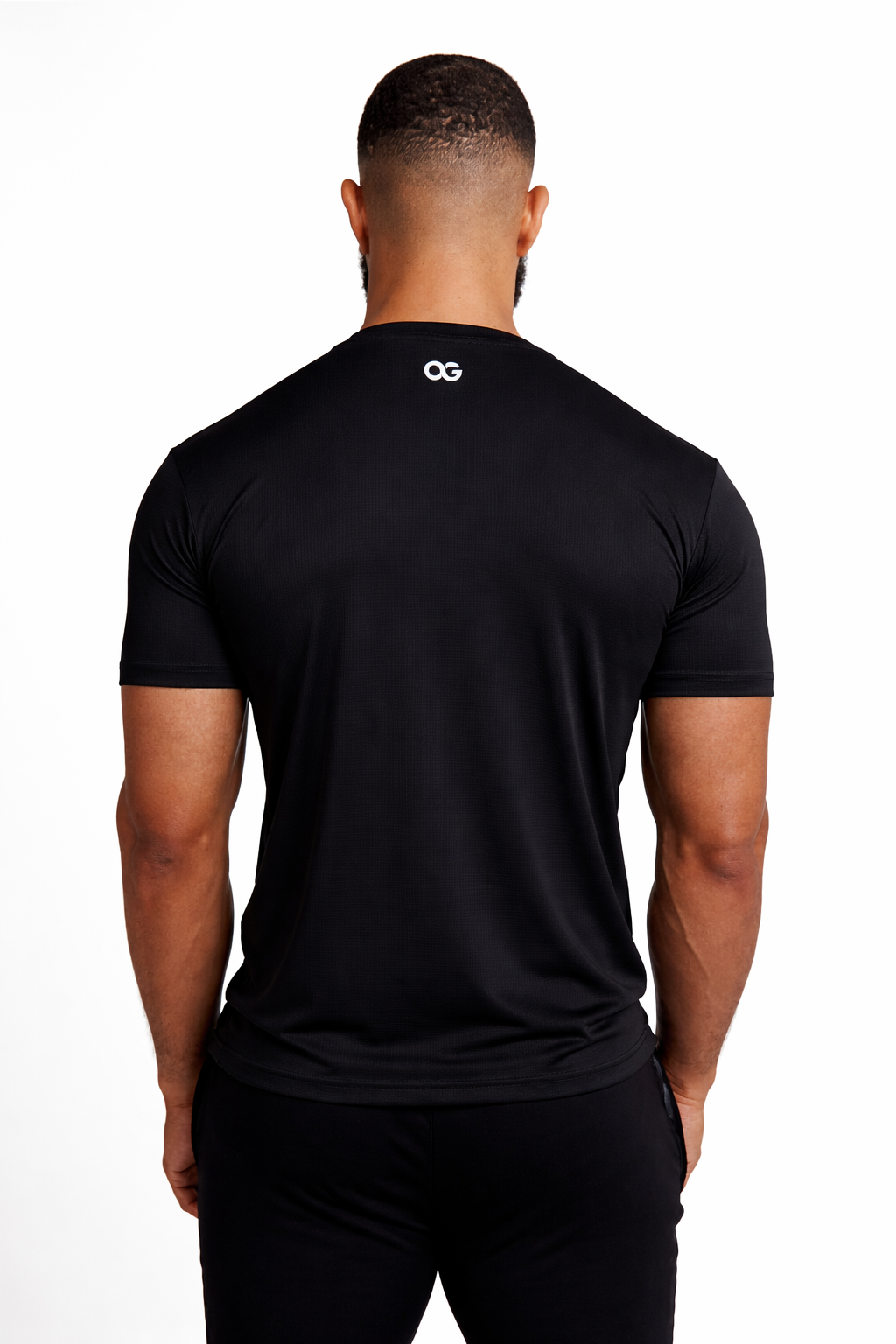 OG Men's Premium Performance Tee Black - Back view, white OG logo at neckline - Original Greatness